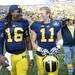 Michigan captains senior quarterback Denard Robinson and senior safety Jordan Kovacs walk off the field together after beating Iowa 42-17 at Michigan Stadium. Melanie Maxwell I AnnArbor.com